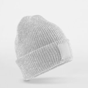 Bonnet enfant à large rabat avec empiècement